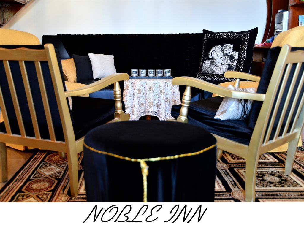 Noble Inn ลูตรากี ห้อง รูปภาพ