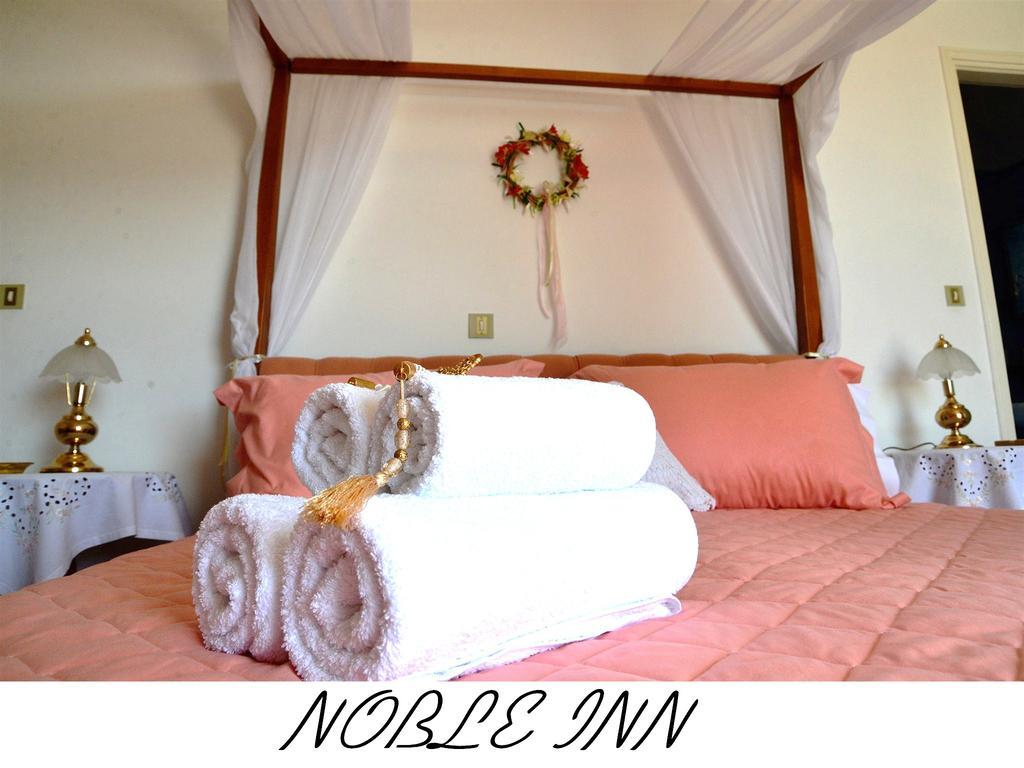Noble Inn ลูตรากี ห้อง รูปภาพ